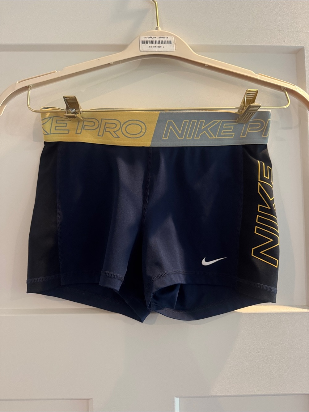 Nike Women's Navy Bike Shorts with Yellow Accents